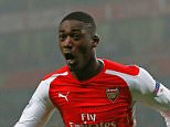 French striker Yaya Sanogo has been named in Arsenal's Champions League squad