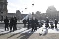 Armed police surround the Louvre on Friday morning.