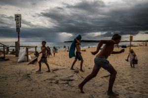 Swimmers at Maroubra Beach scramble as the southerly change brings relief after temperatures reached 38 degrees today. ...
