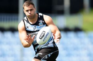 SYDNEY, AUSTRALIA - SEPTEMBER 27: Wade Graham of the Sharks takes a pass during a Cronulla Sharks NRL training session ...