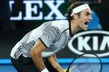 The moment he won: Roger Federer celebrates championship point.