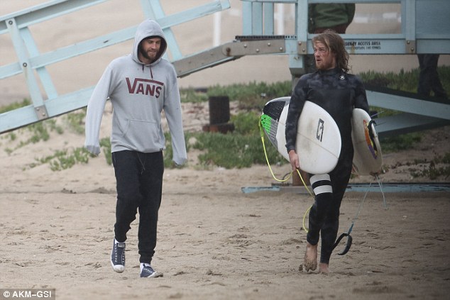 Braving the freezing temperature:  Liam wrapped the hoodie's sleeves around his hands to cover them from the cold.