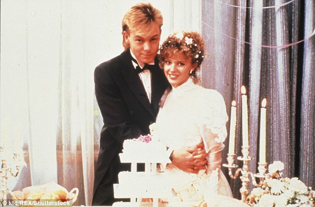 Only one wedding in the Eighties came close to capturing as many British hearts as the fairy- tale marriage between Charles and Diana — the nuptials between Kylie Minogue and Jason Donovan in the TV soap Neighbours (pictured). Kylie, 48, has just asked her struggling actor fiancé Joshua Sasse to leave their multi-million pound west London home