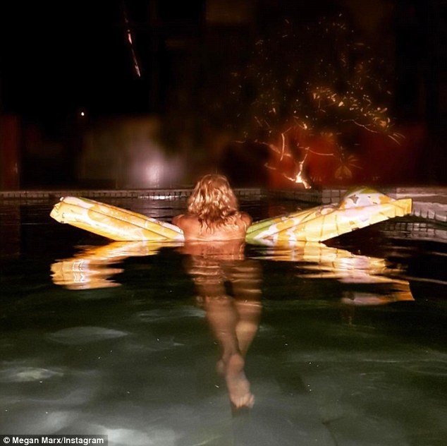 A new ritual: Megan took a cheeky skinny dip on Wednesday with her beau Tiffany 