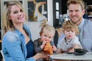 Victoria Davis poses for a photo with her husband Demian Gibbins and children Tristan and Evangeline at their cafe and ...