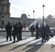 Armed police surround the Louvre on Friday morning.