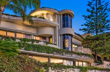 Car dealer Neville Crichton swaps $60 million Sydney mansion for a $33 million mini-me up the road