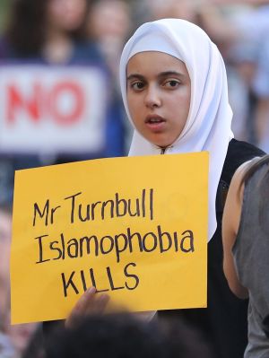 A protester sends a message to Australian Prime Minister Malcolm Turnbull in Melbourne.