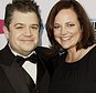 FILE - In this Jan. 12, 2012 file photo, Patton Oswalt, left, and his wife Michelle Eileen McNamara arrive at the 17th Annual Critics' Choice Movie Awards in Los Angeles. Oswalt says coroner?s officials have told him that his wife died last year from a combination of prescription medications and an undiagnosed heart condition. His statement, released by a publicist, says coroner?s officials have informed him that the blockages, combined with her taking the medications Adderall, Xanax and the pain medication fentanyl, caused his wife?s death in April 2016. McNamara died April 21 in her sleep at age 46. (AP Photo/Matt Sayles, File)