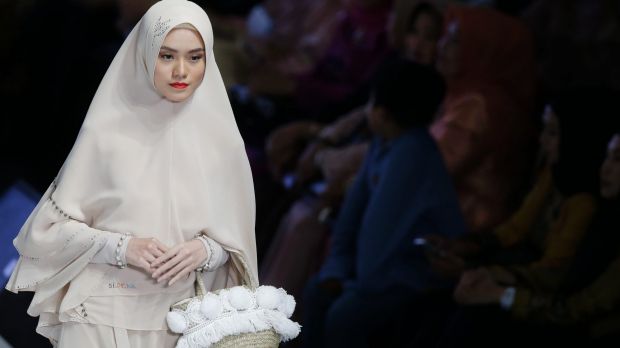 Modest-wear is the new black: a model shows a creation by SI.SE.SA during Indonesia Fashion Week.