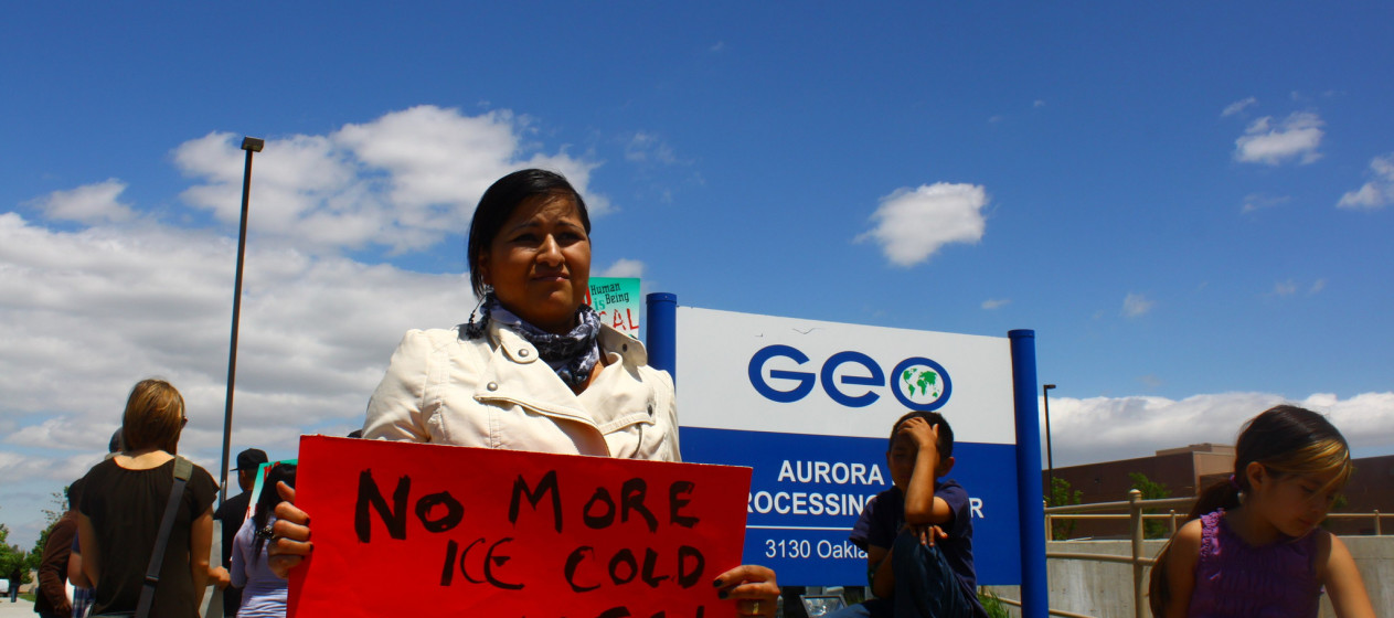 Protesters gather outside of GEO Group's immigration detention center in Aurora, Colorado (Justin Valas on Flickr)