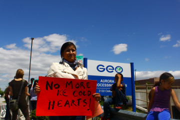 Protesters gather outside of GEO Group's immigration detention center in Aurora, Colorado (Justin Valas on Flickr)