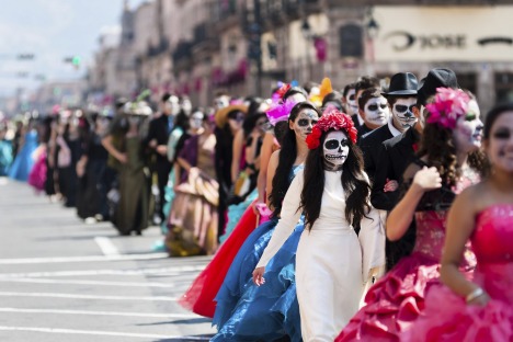 MORELIA, MEXICO - NOVEMBER 01: Young couples, costumed as ??La Catrina??, a Mexican pop culture icon representing the ...