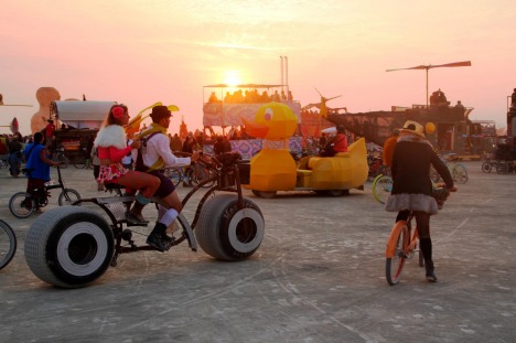 F36WRA A sunset gathering on the playa during the annual Burning Man festival in the desert August 29, 2014 in Black ...