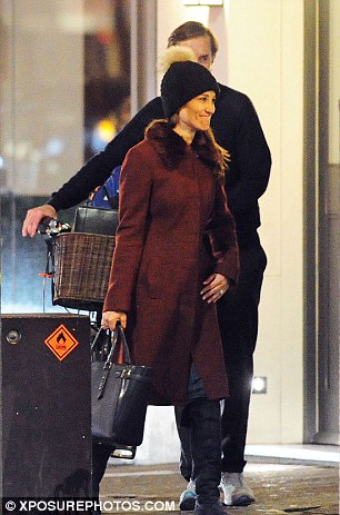 Pippa was smiling as they left the store, three months ahead of the couple's wedding