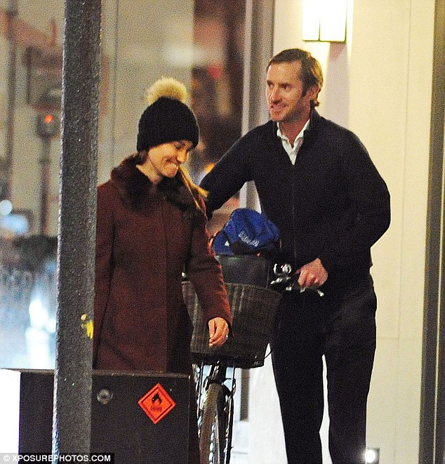 The pair were all smiles as they left the flooring store in Fulham Road yesterday