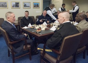 Secretary of Defense James Mattis speaks with Command Sgt. Maj. John W. Troxell, Senior Enlisted Advisor to the Chairman of the Joint Chiefs of Staff and Senior Enlisted Leaders of the Armed Forces before a working breakfast at the Pentagon in Washington, D.C., Jan. 27, 2017