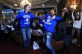 Leicester City fans celebrate in Leicester after Chelsea's Eden Hazard scores the equalising goal against Tottenham ...