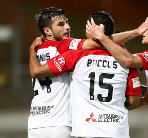 Terry Antonis, Kearyn Baccus and Jack Clisby of the Wanderers celebrate the goal of Emilio Martinez.