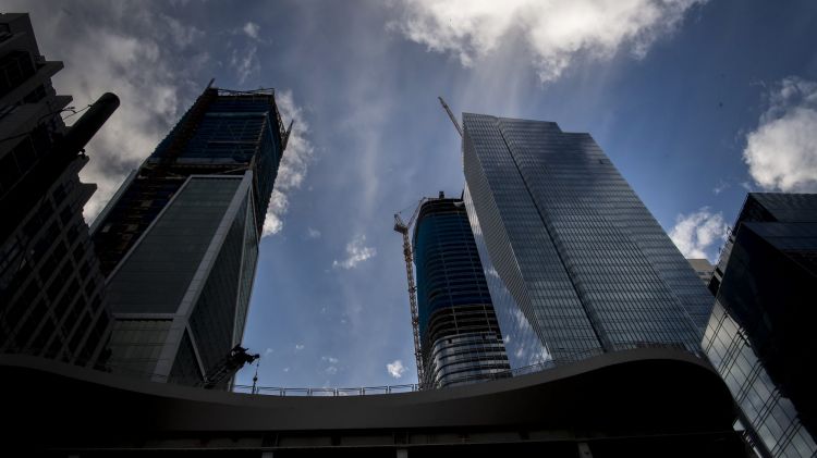 The Millennium Tower, right, stands in San Francisco. It was touted as the most luxurious tower in San Francisco, but started to sink.