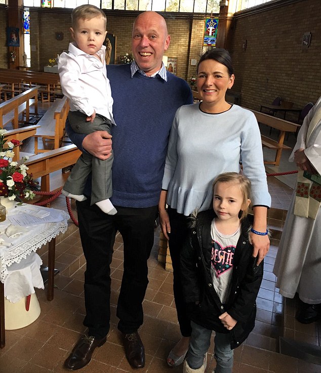 Speaking from America, Mr Hunt, 44, from Yateley, Hampshire, said last night: 'To put a value on my son's life has been agony.' Pictured: Freddie with his parents and sister Holly, six