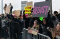 Protesters assemble at John F Kennedy International Airport in New York last week.