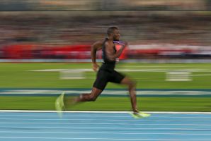 Bolt competes in the mixed 4x100 metre relay.