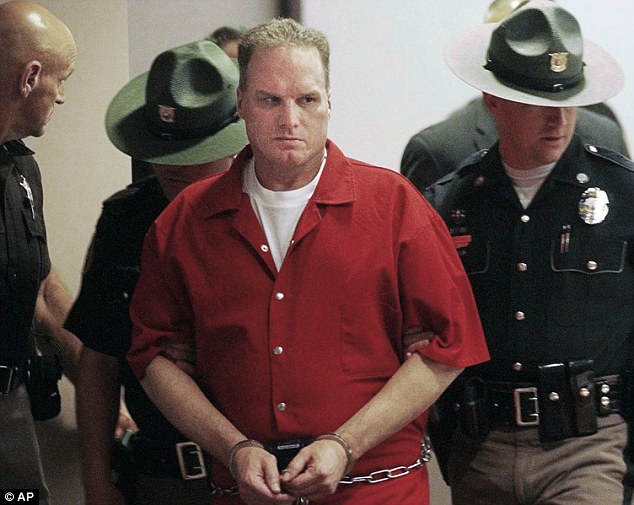 Gary Lee Sampson, 57, (pictured in 2004) who admitted to killing three people in a 2001 carjacking rampage erupted in a Boston court on Friday when a judge sentenced him to death