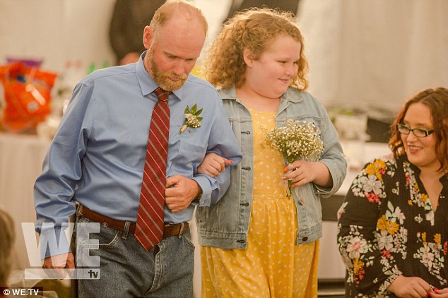 Children come first: Boo Boo and Sugar 'lit a candle together, and Jennifer and her son Joseph ¿ who walked her down the aisle ¿ also lit a candle with one another,' added the site