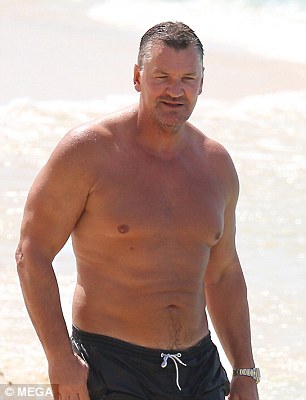 Evergreen! Craig Fairbrass continued to turn heads twenty years on as he enjoyed a beach day in Barbados this week