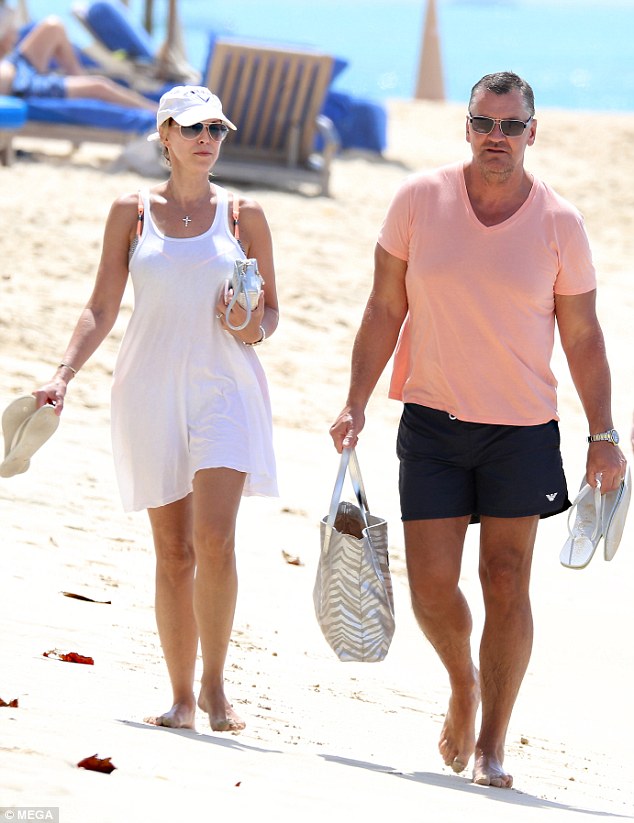 Hot couple! The 53-year-old actor was spotted showing off his toned physique as he caught some rays with his wife Elke Kellick