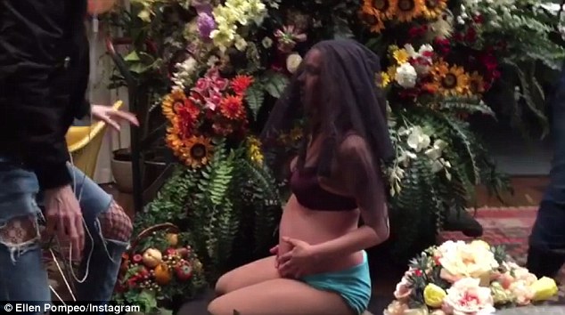 'Amazing! Great! I love it': The affectionate parody sees her recreating the pop star's photo with her pregnant friend, who seems faintly alarmed by the entire process