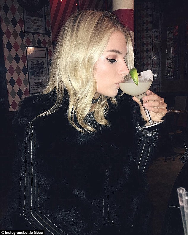 Glam life: The blonde bombshell - who is currently dating Made In Chelsea's Alex Mytton, 25 - also shares a snap of her elegantly sipping on a cocktail last week