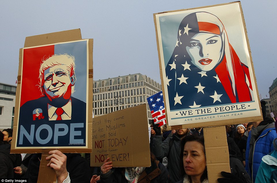 Protesters hold 'no ban no wall' protests in Berlin on Saturday in response to the travel ban and Mexican border wall