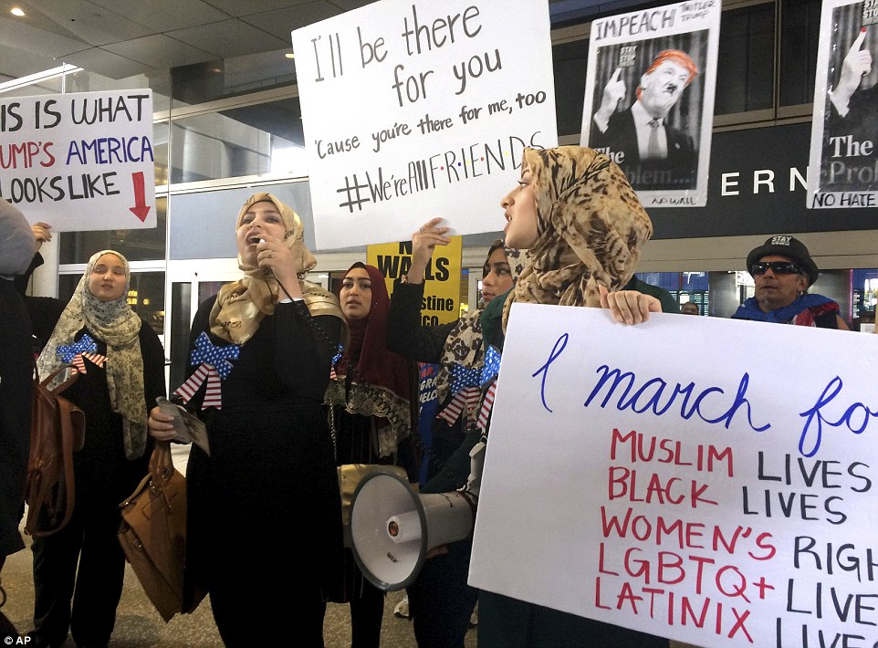 Protesters rally at LAX airport to demonstrate against the travel ban that targets seven Muslim majority countries