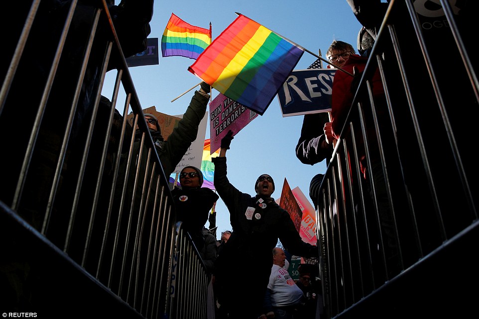 Demonstrators stood outside of Stonewall Inn in New York City to protest the president 