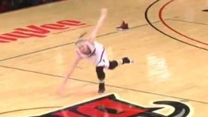 College basketball player just can't stay on her feet