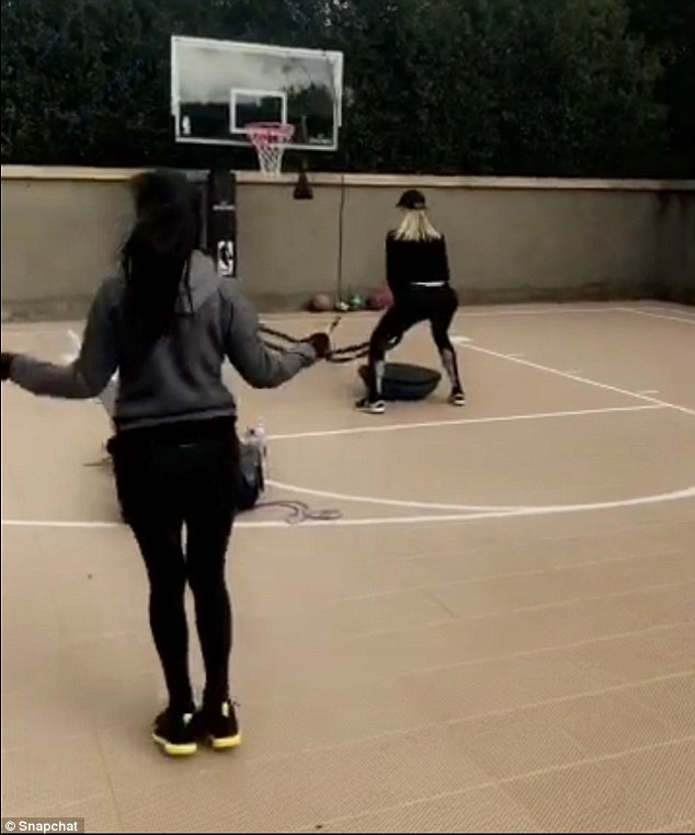 Focused: During their training session on the basketball court, the sisters are seen working with ropes, weights and doing lunges