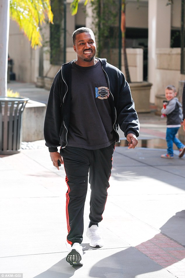 All smiles: During his morning workout, the Bound 2 artist flashed an uncharacteristically bright smile