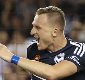 Cop that: Besart Berisha enjoying himself.