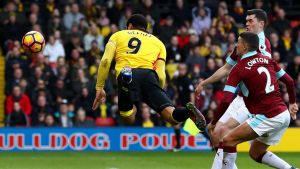 WATFORD, ENGLAND - FEBRUARY 04: Troy Deeney of Watford scores his sides first goal during the Premier League match ...