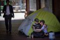 Homeless couple Josh and Tara are camping out near the corner of Flinders and Market Street.