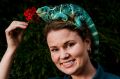 Renee Osterloh, operations manager of the National Zoo and Aquarium, with Phoebe, a Fijian crested iguana. Pheobe's ...