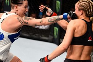 VANCOUVER, BC - AUGUST 27:  (L-R) Bec Rawlings of Australia punches Paige VanZant of the United States in their women's ...