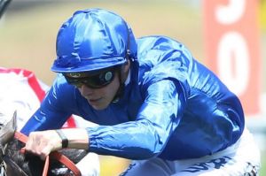 Jockey James Doyle rides Veranillo to win The Hinchinbrook Plate at Royal Randwick racecourse. 