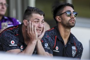 Resolution in sight: Kieran Foran watches the Auckland Nines with teammate Shaun Johnson.