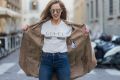 FLORENCE, ITALY - JANUARY 11: German fashion blogger and model Alexandra Lapp is wearing retro vibe Gucci printed cotton ...
