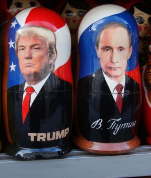 Traditional Russian wooden dolls called Matryoshka depicting Russian President Vladimir Putin and Donald Trump.