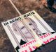 A broken poster depicting the leader of the ruling Social Democrat party Liviu Dragnea, which reads "In a democracy, ...