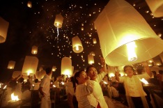 People release floating lanterns during the festival of Yee Peng in the northern capital of Chiang Mai.